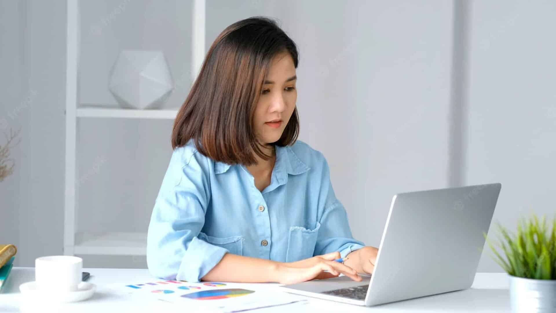 work from home asian woman working with laptop computer home 7190 3248